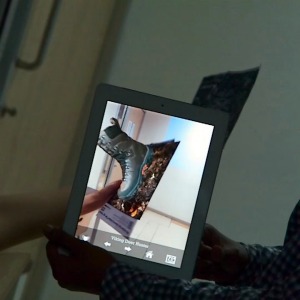 Altemash demonstrating an Augmented Reality application. 